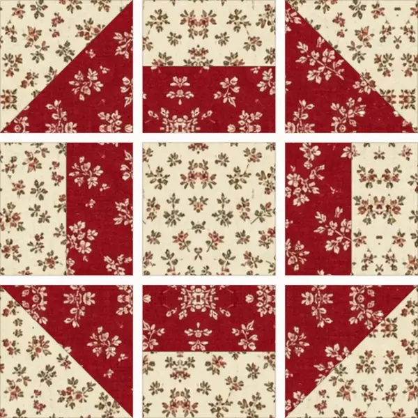Churn Dash block laid out in its units before sewing