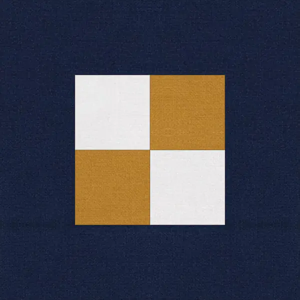 Framed Four Patch quilt block in navy and white